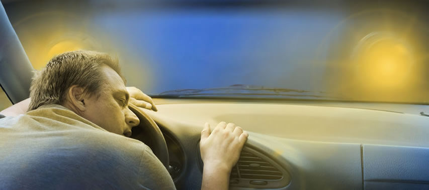 image of man asleep at the wheel