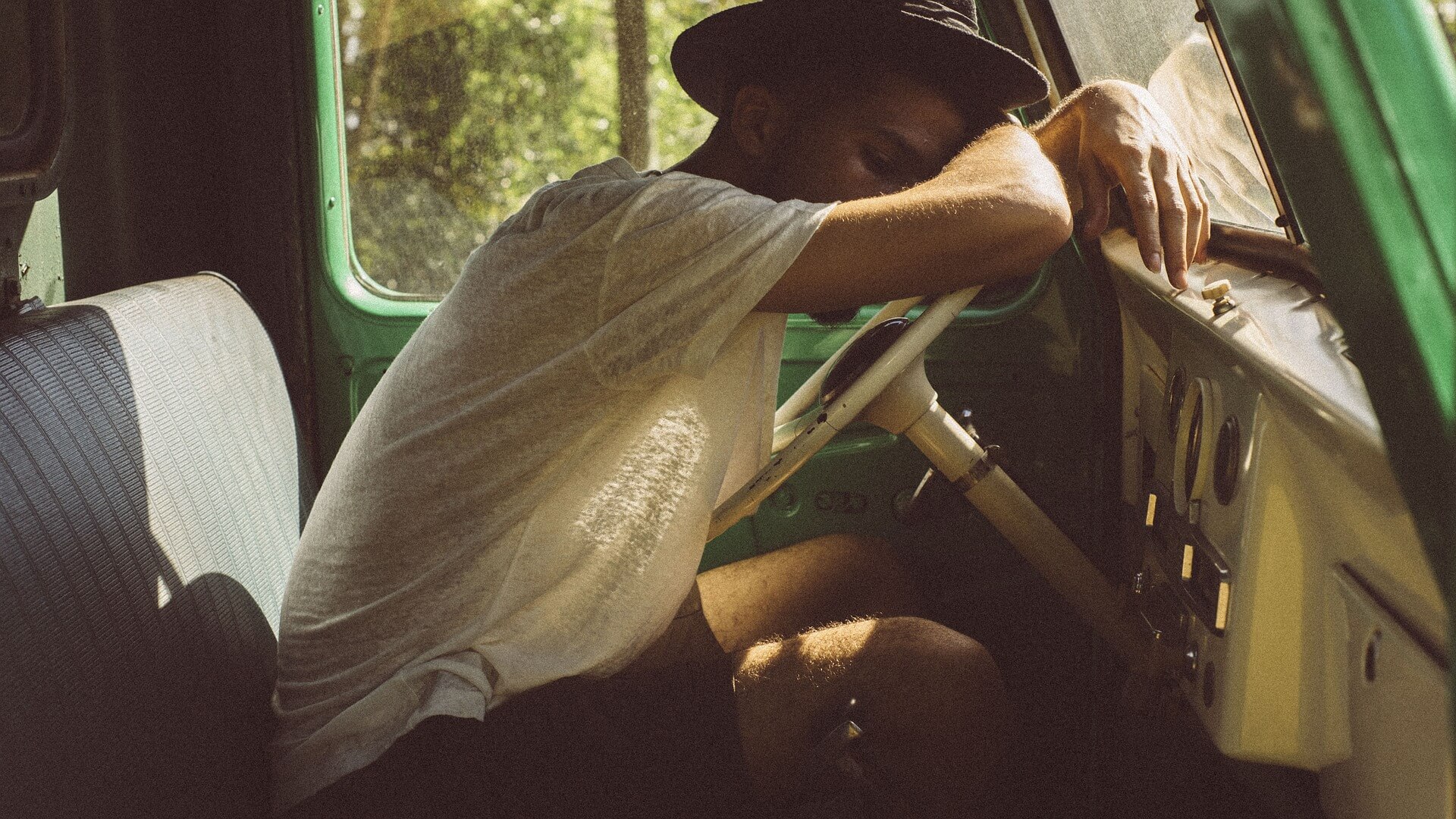 image of tired man at wheel