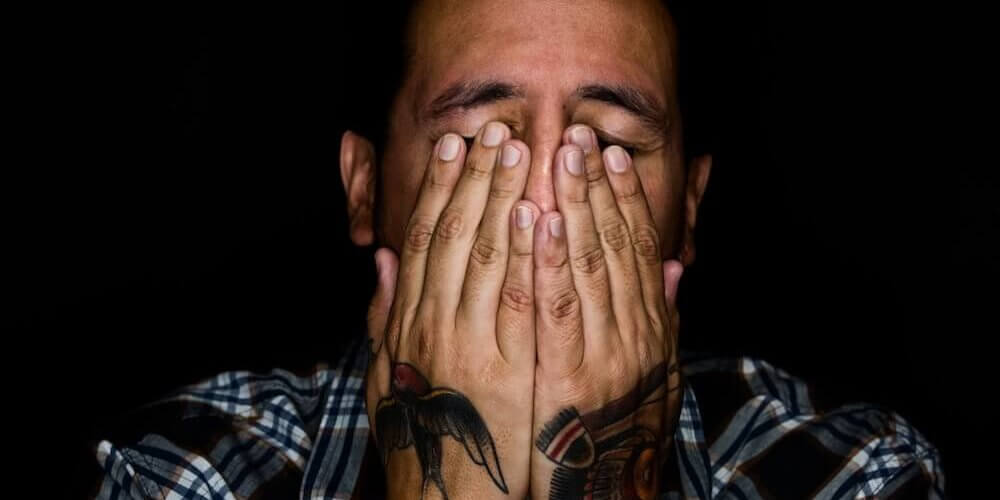 image of man stressed and tired