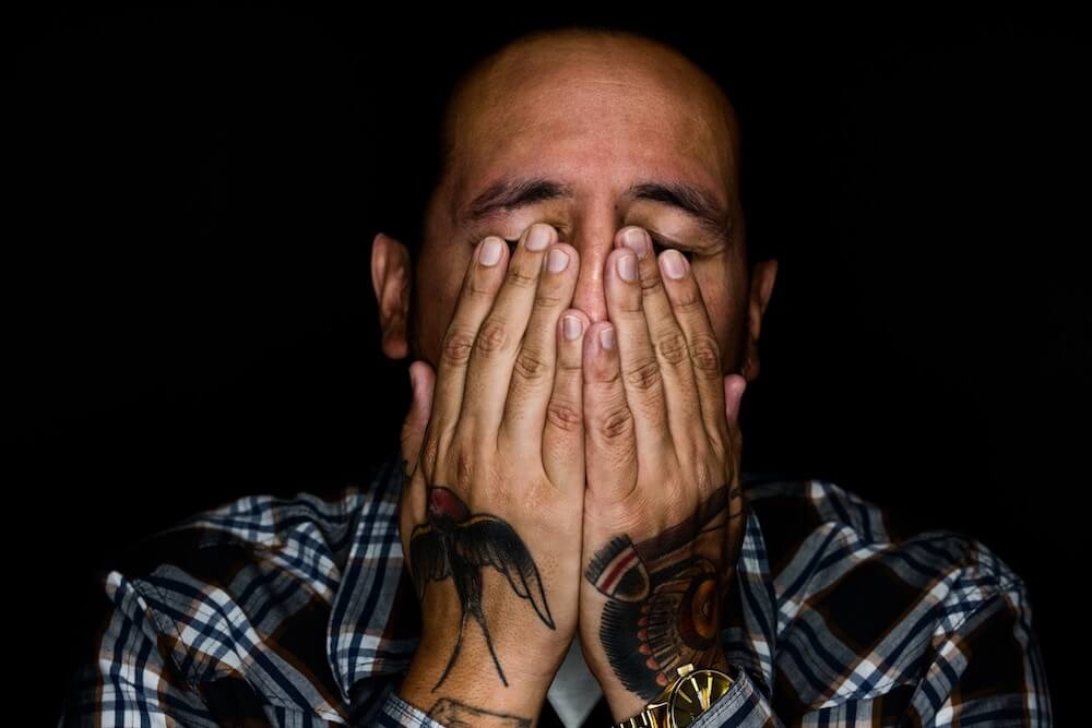 image of man stressed and tired
