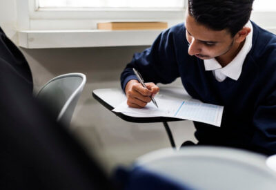 boy taking exam image