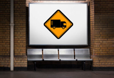sign displaying a graphic of a lorry