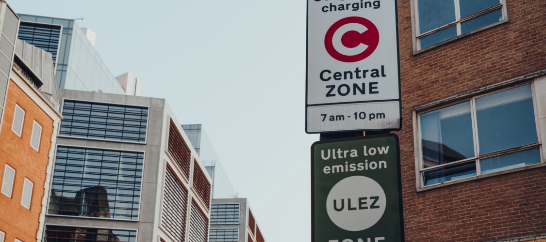 london road sign indicating congestion charge and ultra low emission zone (ulez)