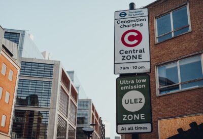 london road sign indicating congestion charge and ultra low emission zone (ulez)